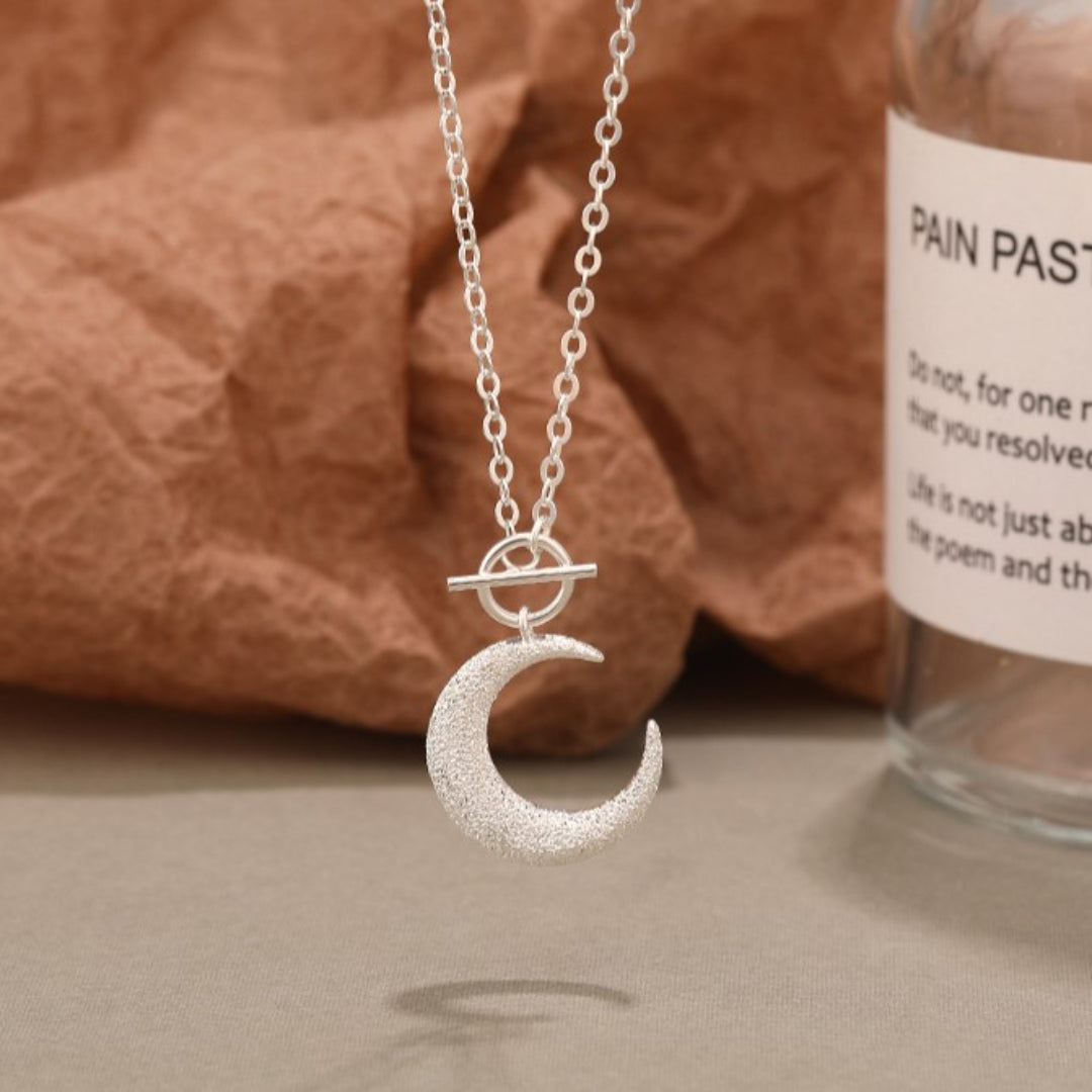 Maanverlichte charm ketting